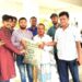 মগনামায় বন্যায় ক্ষতিগ্রস্থদের মাঝে চাল বিতরণ